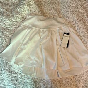 White Gilly hicks workout skirt with built-in shorts brand new size small
